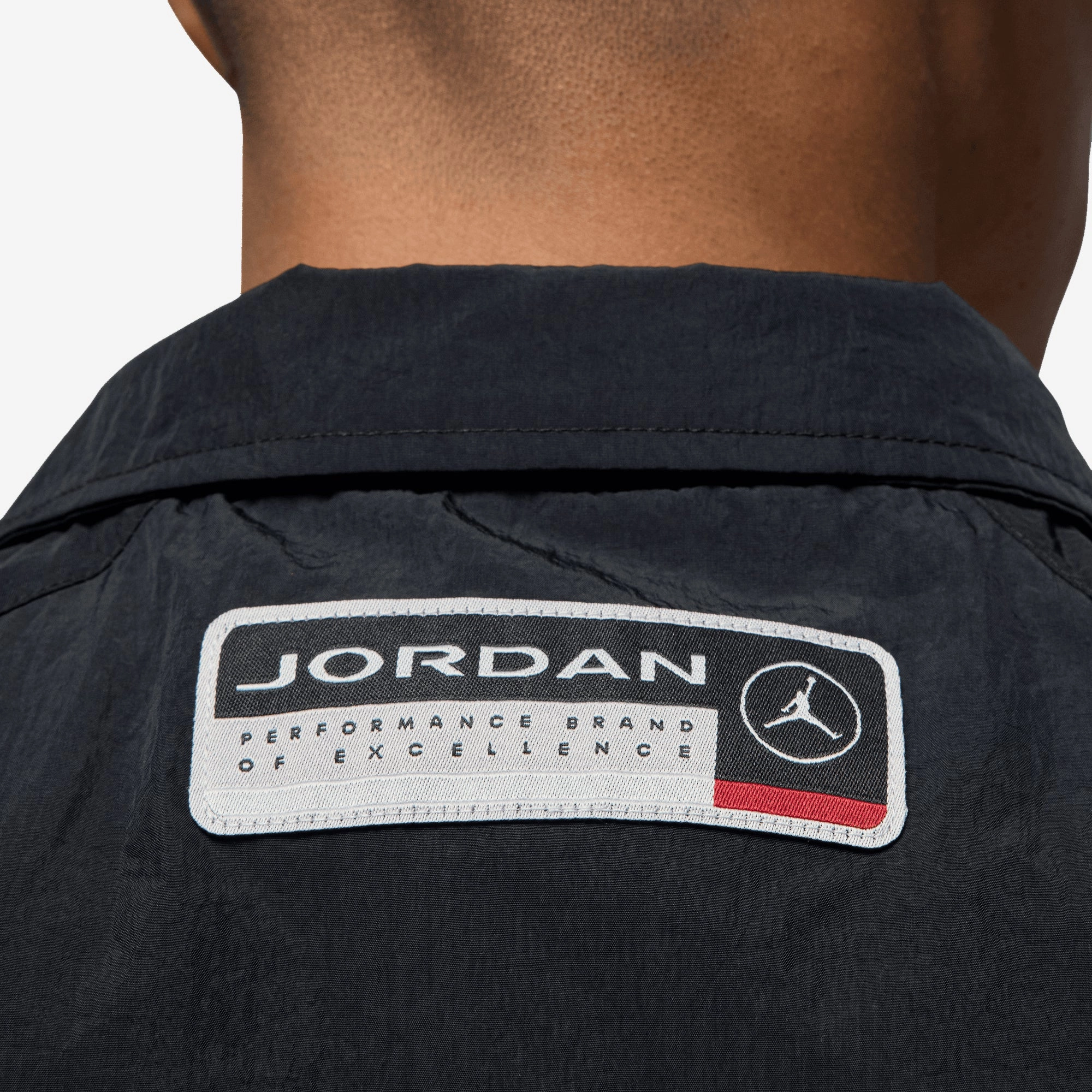 JORDAN | ESSENTIALS COACHES JACKET { BLACK/SAIL