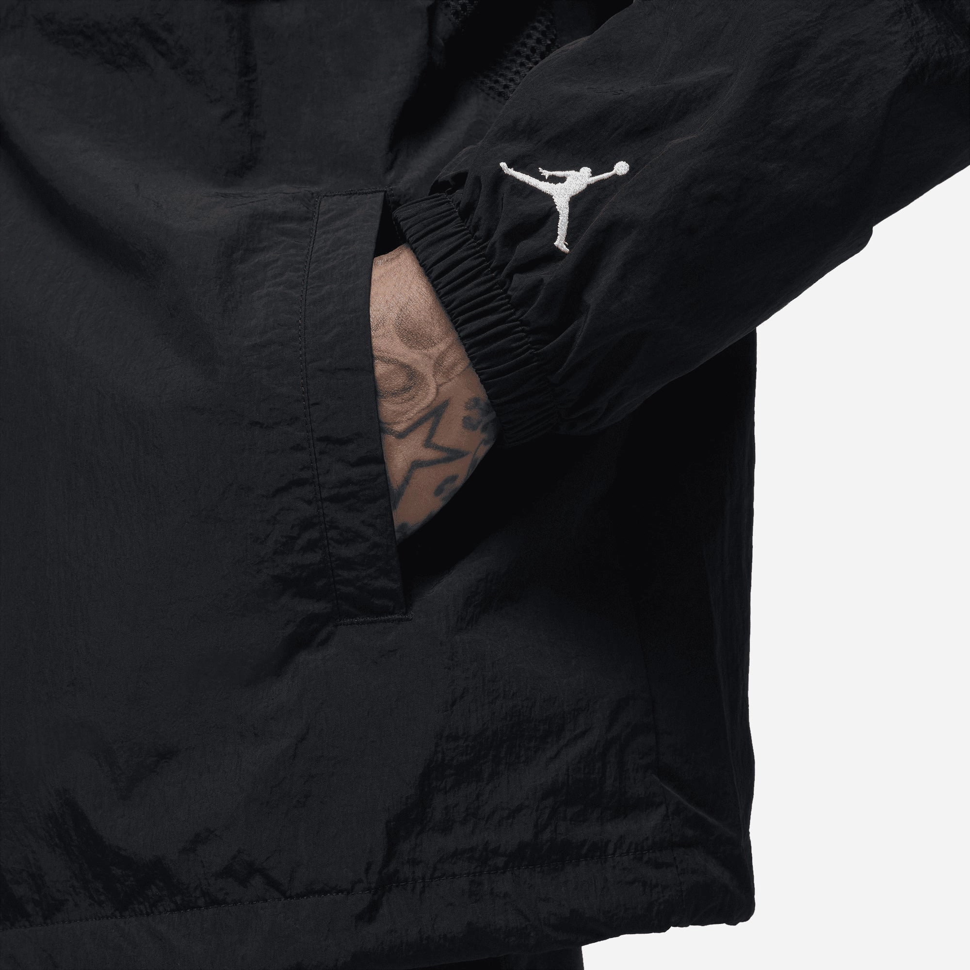JORDAN | ESSENTIALS COACHES JACKET { BLACK/SAIL