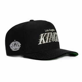 New Era 9Fifty A-Frame Los Angeles Kings Logo Patch Word Snapback Hat - Black. Metallic Silver