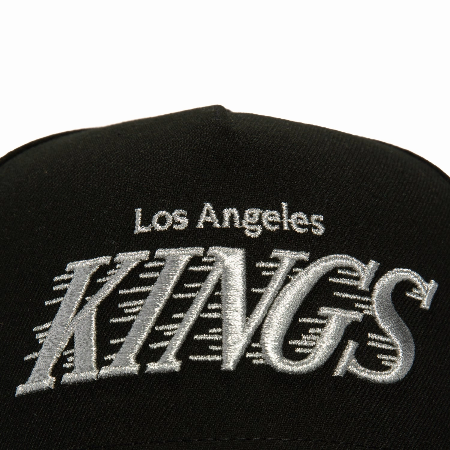 New Era 9Fifty A-Frame Los Angeles Kings Logo Patch Word Snapback Hat - Black. Metallic Silver