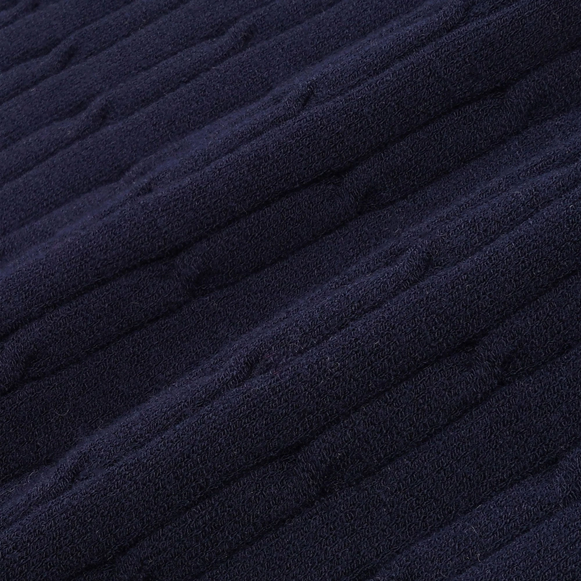 SPORTY & RICH | SERIF LOGO MINI CABLE SKIRT { NAVY